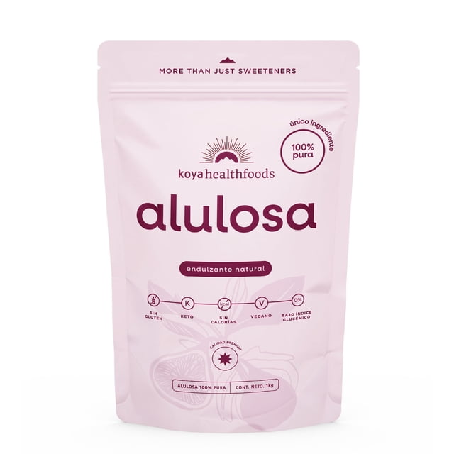 koya alulosa en polvo 1kg | alulosa 100% pura | endulzante natural sin azúcar apto para dietas keto | sustituto de azúcar con casi cero calorías | allulose sweetener — Bolsa frontal, vista centrada del empaque rosa pálido de 1 kg con logo 'koya healthfoods' y el nombre grande 'alulosa'. Sellos circulares muestran '100% pura' y los íconos señalan 'sin gluten', 'keto', 'sin calorías', 'vegano' y 'bajo índice glucémico'; texto 'endulzante natural' y cierre resellable visibles; también apto para endulzar bebidas y recetas keto.