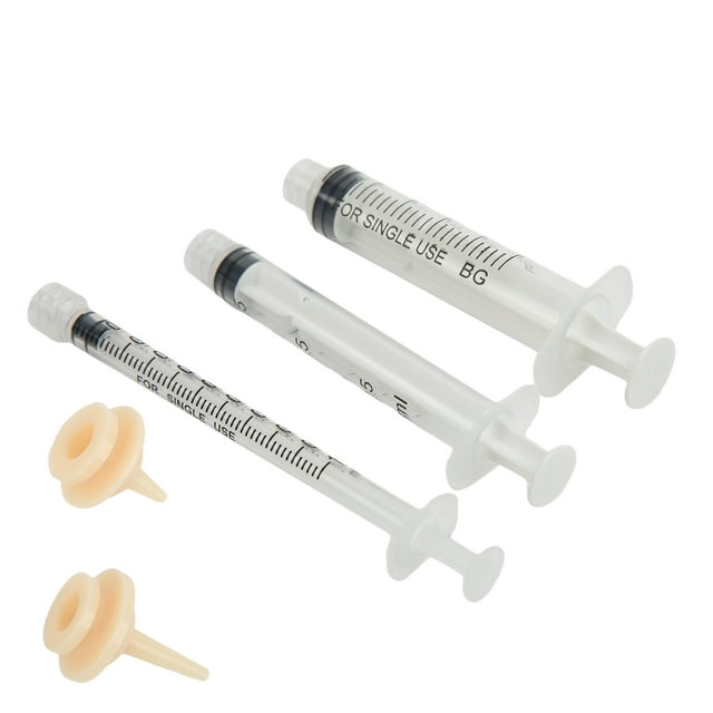 3 uds jeringa para mascotas anggrek dispensador de jeringa para gatos perros tres jeringas transparentes con graduaciones y émbolos visibles (1 ml, 3 ml, 5 ml) y dos cabezales de silicona reemplazables color beige, vista cenital sobre fondo blanco; también aptas para dosificar medicamentos líquidos o suplementos en viajes.