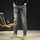 thumbnail image 2 of Pantalones vaqueros para hombre con parches rotos y agujeros, pantalones vaqueros ajustados para hombre, ajustados, ajustados, con gráficos retro rotos, moda 2024, 2 of 5