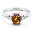 thumbnail image 2 of Gem Stone King 925 Sterling Silver Orange Red Madeira Citrine and White Created Sapphire 3-Stone Rings for Women (1.18 Cttw, Gemstone, Oval 8X6MM, Available in Size 5, 6, 7, 8, 9), 2 of 4