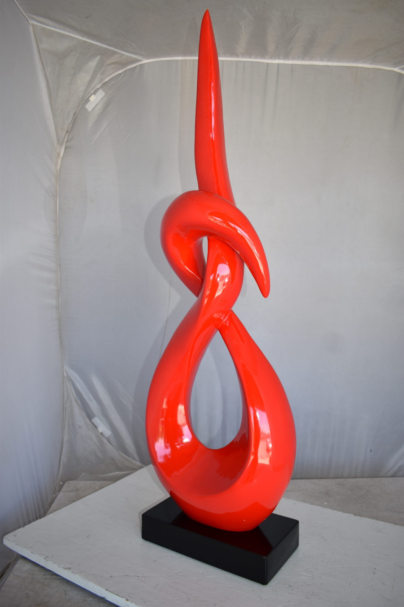 Modern Art Red Eternity Sculpture Made of Resin on A Base Size: 13" x 7" x 42"H