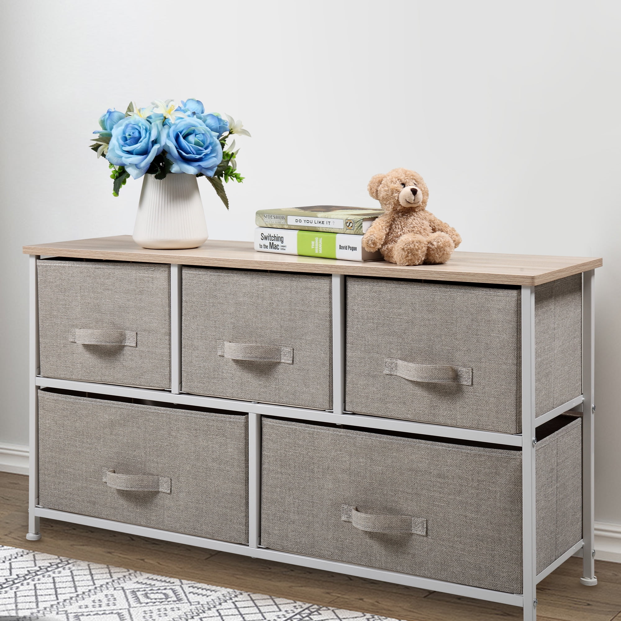 white dresser with toy storage