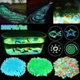 thumbnail image 1 of 300Pcs Glow In The Dark Pebbles Garden Decoration Outdoor Yard Decor Luminous Gravel Aquarium Glow Rocks Fish Tank Color DecorA2GERMANY He Qiyong unisex, 1 of 1