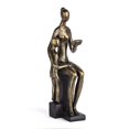 thumbnail image 1 of Danya B. Reading to a Child Resin Sculpture, 1 of 1