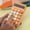 Orange#3, variant on Standard Desktop Calculator | Mini Pocket Size | 8-Digit LCD Display | Tactile Round Keys | Energy Efficient AAA Battery Operated | Gradient Finish | Non-Slip Base | Durable | Easy-Read