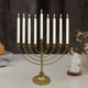 thumbnail image 2 of Candelabro de Hanukkah de hierro dorado, superficie de arena de nueve cabezas, 2 of 6