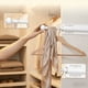 thumbnail image 5 of Organizador de armario de pared con diseño deslizante: barra para colgar ropa extensible y temporal para el almacenamiento en armarios domésticos., 5 of 6