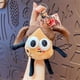 thumbnail image 1 of Lindo llavero de muñeca con colgante de mochila, feo y lindo, ojos grandes, boca de salchicha., 1 of 3