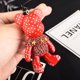 thumbnail image 1 of Cuerda tejida de cuero Bomgom Popobe Gloomy Rhinestone llavero borla gafas oso llavero anillo titular bolso encanto colgante negro xuanjing  unisex, 1 of 2