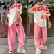 thumbnail image 2 of Conjuntos de pantalones negros con estampado gráfico para hombre, pantalones deportivos, camisetas, pantalones, trajes para hombre, tendencias, disfraces, conjunto de dos piezas, estilo coreano 2024 X, 2 of 5
