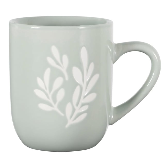 12oz green ceramic mug featuring a white embossed leaf pattern and a rounded handle.