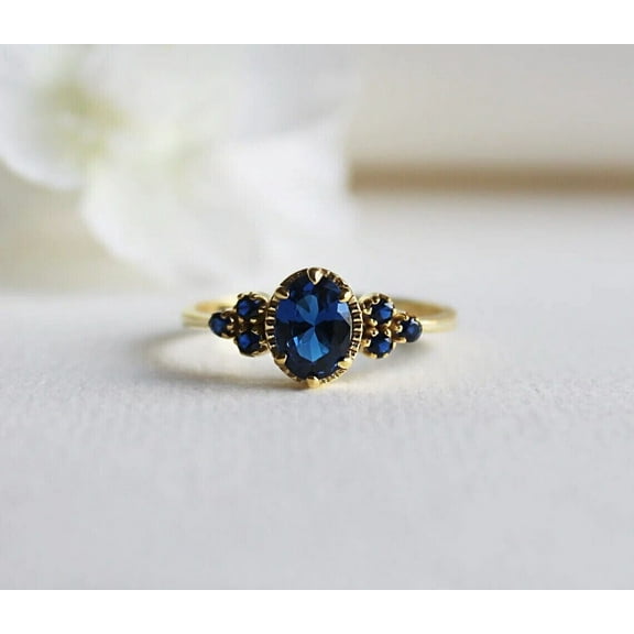 3Ct Lab Created Blue Sapphire Women's Ring 14K Yellow Gold Plated Silver Oval Cut