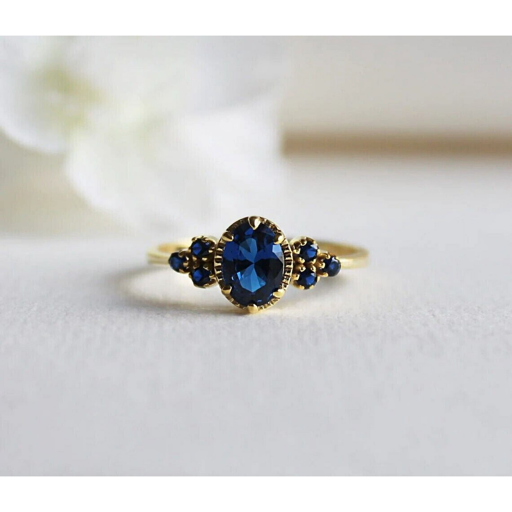 3Ct Lab Created Blue Sapphire Women's Ring 14K Yellow Gold Plated Silver Oval Cut