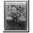 thumbnail image 2 of Historic Framed Print, [Luther Burbank, full-length portrait, seated outdoors in a wicker rocking chair, reading, with a field of cactus in the background], 17-7/8" x 21-7/8", 2 of 9