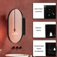 thumbnail image 4 of Hassch Oval Medicine Cabinet with Mirror For Bathroom Wall, Surface Mount Or Recessed Storage Cabinet With Mirror -20" x 34", Metal Framed Modern Medicine Cabinet (Black), 4 of 9