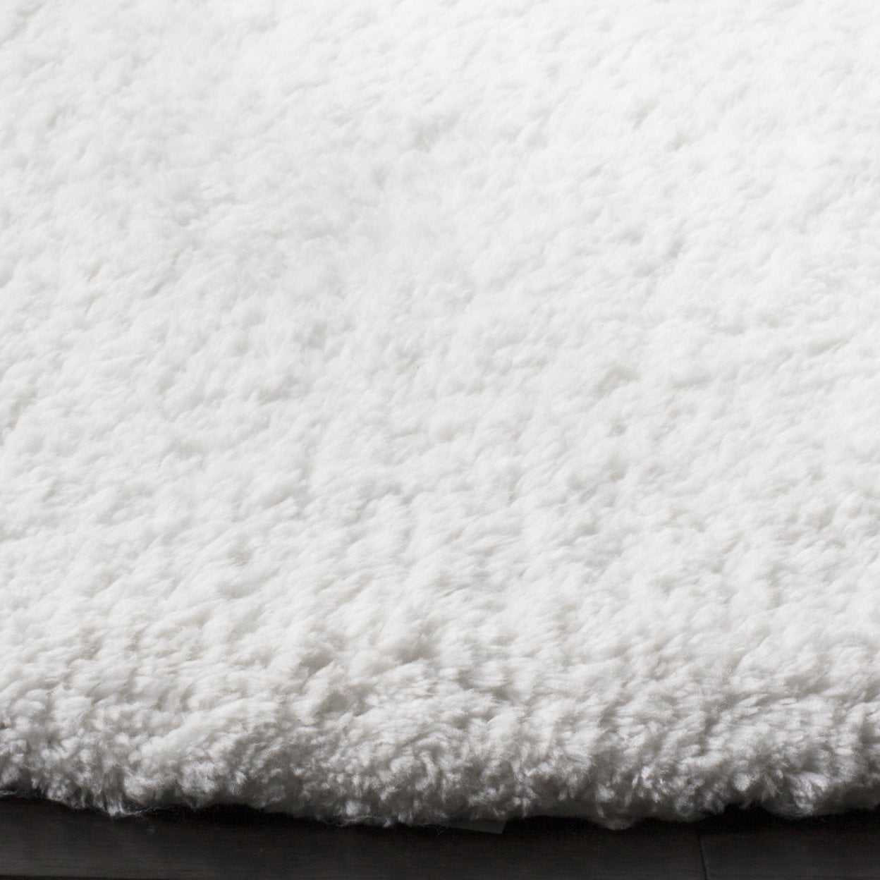 SAFAVIEH Sybella Solid Plush Polyester Sheep Shag Area Rug, Ivory, 8' x 10'