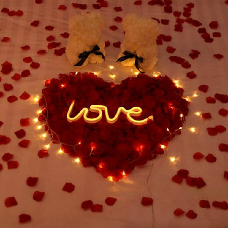 Heart Petals On Bed Photos and Images