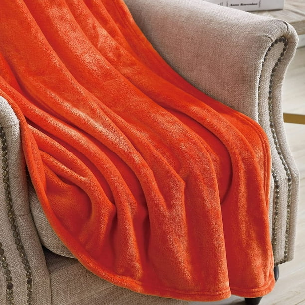 Orange fleece throw hotsell