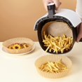thumbnail image 2 of Revestimientos para freidora de aire, 50 piezas de papel pergamino desechable, papeles de aceite para horno, tapete para cesta para cocinar al vapor antiadherente, papel de cocina, 2 of 5
