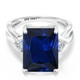 thumbnail image 2 of Gem Stone King 10.44 Cttw 10K White Gold Blue Created Sapphire and Lab Grown Diamond Engagement Ring for Women |  | Emerald Cut 14X10MM | Trillion 4MM (Size 5), 2 of 5