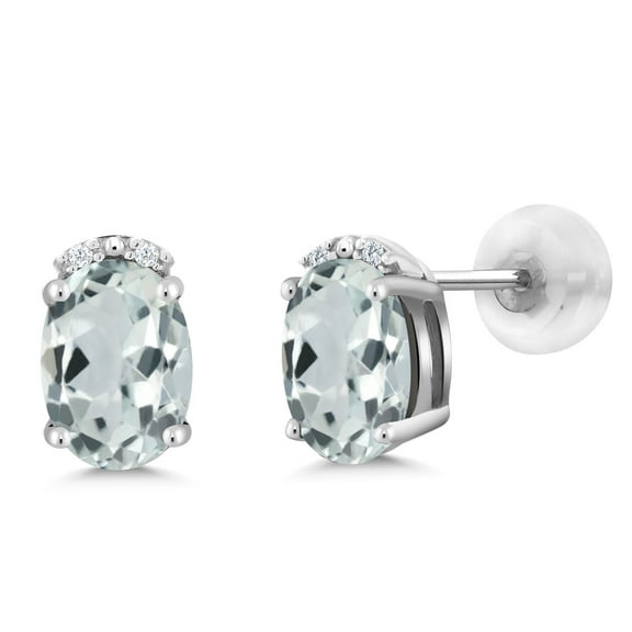 Gem Stone King 10K White Gold Sky Blue Aquamarine and White Diamond Earrings for Women (1.47 Cttw, Gemstone March Birthstone, Oval 7X5MM)