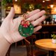 thumbnail image 1 of Adornos navideños, adornos navideños, regalos navideños, corona navideña, funda protectora de cuero, llavero, colgante para equipaje o accesorio colgante., 1 of 7