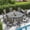 Black Table-Brown Chairs, variant on VOXBIN Patio Dining Set for 6 Outdoor Furniture Includes 53.1" Round Patio Table and Swivel Chairs, Black Tabletop and Brown Fabric