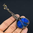 thumbnail image 4 of Natural Guitar Lapis Lazuli Gemstone Handmade Copper Wire Wrap Pendant 4.33, 4 of 4