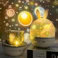 thumbnail image 3 of Lampe LED Rotation 360° 8 Chansons 6 Films de Projection 4 Couleurs Cadeau de Mode Noël Anniversaire Veilleuse pour Enfants Projecteur d'Étoiles, Veilleuse Rechargeable Musicale et Lumineuse pour Bébé, 3 of 5