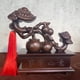 thumbnail image 1 of Rosewood carved persimmon symbolizing good fortune and auspiciousness; solid wood ornament for home, living room, TV stand, or office decoration., 1 of 4