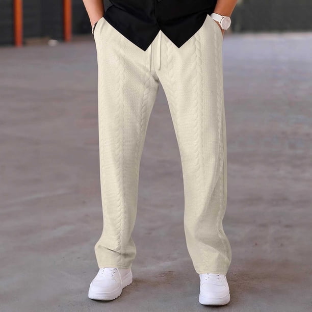 Pantalones deportivos holgados de poliéster para hombre, de color liso, informales, con cordón y cintura elástica y bolsillos.