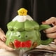 thumbnail image 4 of Taza de Cerámica con Forma de Árbol de Navidad, Tapa y Varilla para Mezclar, 420 Ml, Gran Capacidad, para Café, Té, Fiestas, Color Rojo y Verde, Ideal para El Hogar, La Oficina y Regalos de Navidad., 4 of 6