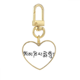 thumbnail image 1 of Sánscrito patron negro personaje budista Llavero de metal en forma de corazón dorado, 1 of 3