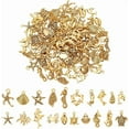 thumbnail image 1 of Juego de 100 colgantes de estilo tibetano con forma de concha, estrella de mar, delfín y peces marinos, surtidos en 20 estilos., 1 of 9