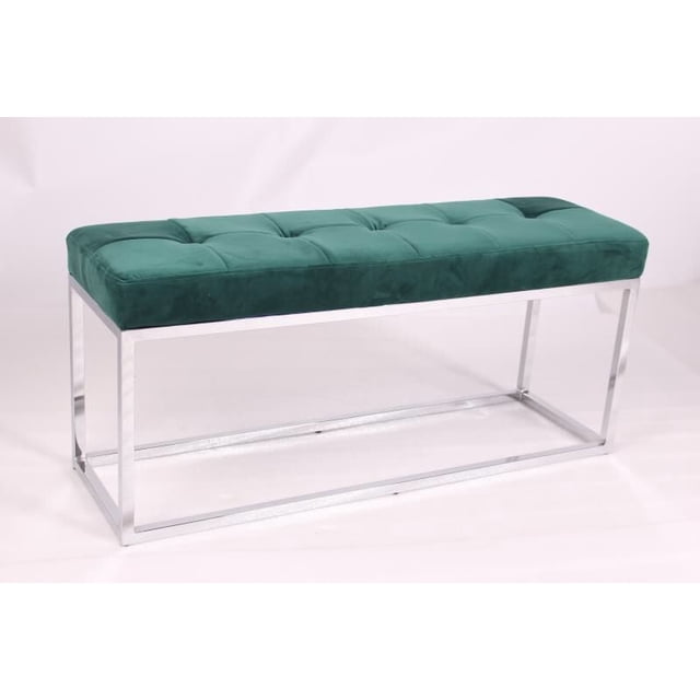 Banc rembourré en velours vert avec base en acier inoxydable.
