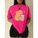 thumbnail image 3 of Playera Blusa De Capybara Tomando Refresco Ropa Divertida Para Mujer Capibara Color Fucsia Talla Chica Marca Emil SaEs, 3 of 4