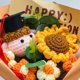 thumbnail image 5 of Muñeca de ganchillo con ramo de graduación de girasol – Set regalo de flores de lana tejida hechas a mano para graduados, recuerdos duraderos y decoración para fiestas, 5 of 9