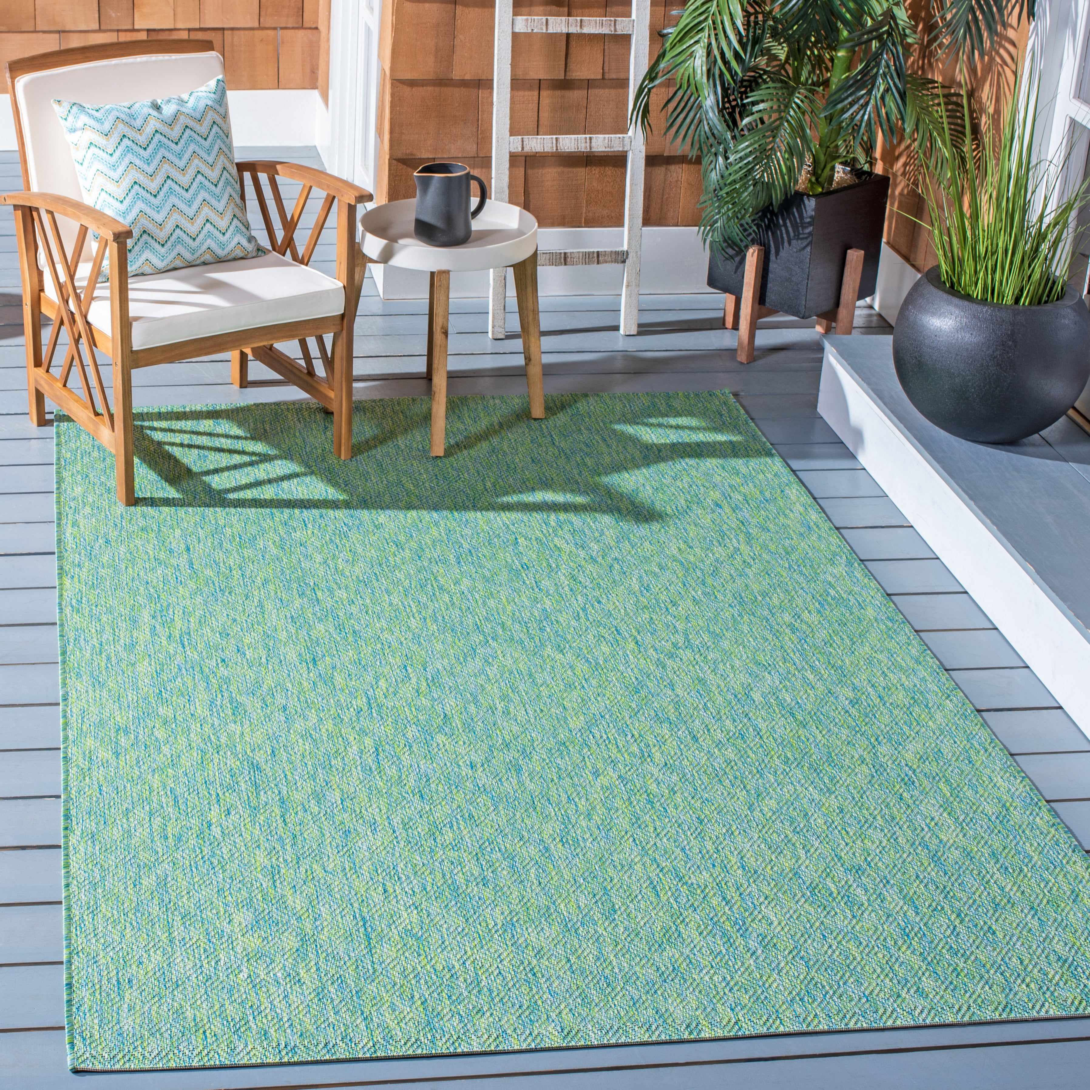 Safavieh Courtyard Finnian Solid Indoor/Outdoor Area Rug, Green/Blue, 4' x 5'7"