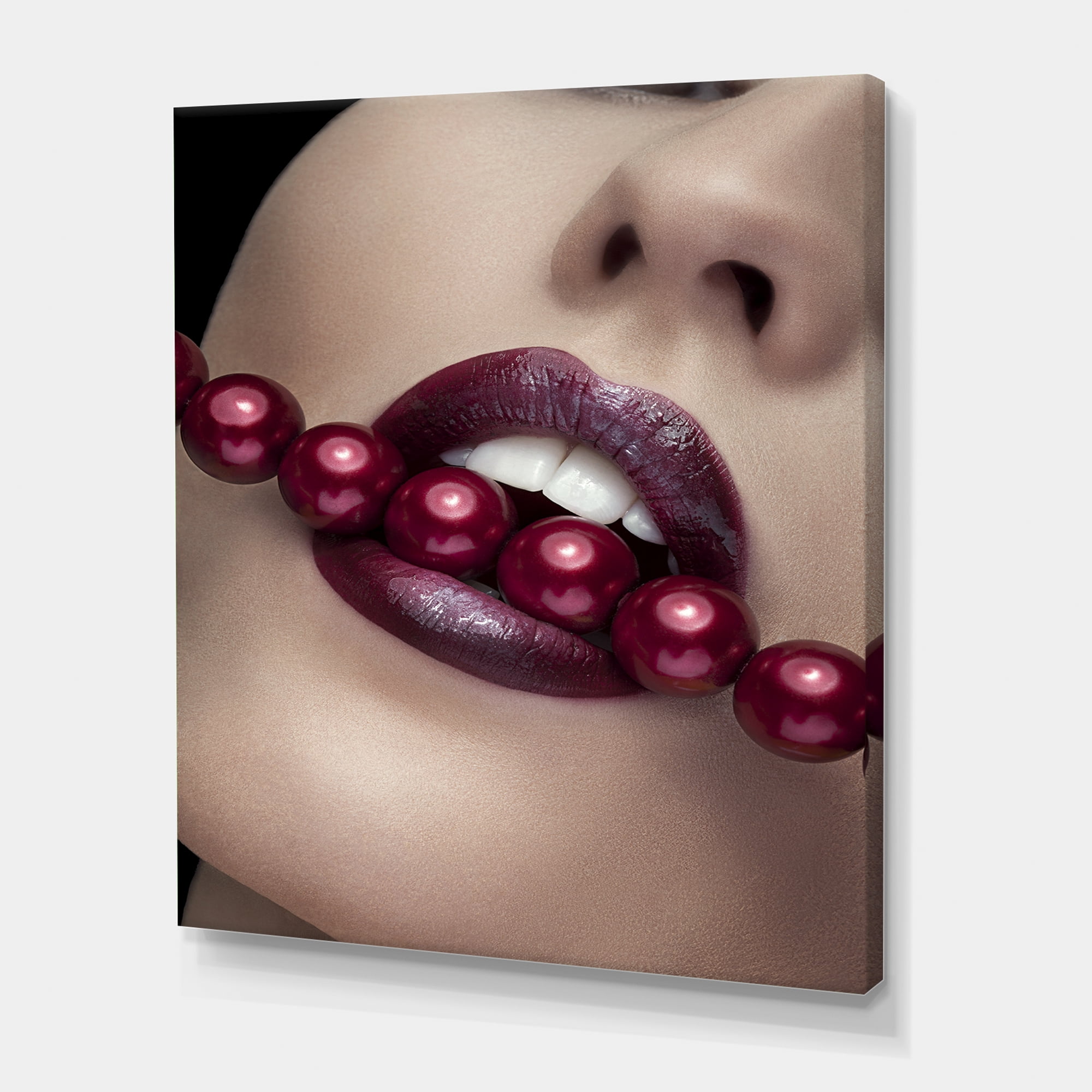 Designart ' Girl Bitting With Red Lips With Red Pearls ' Modern Canvas Wall Art Print