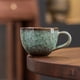 thumbnail image 1 of Taza de café Raku verde, diseño vintage con patrón para lattes y desayuno, 1 of 6