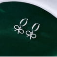 thumbnail image 4 of Sterling Silver Bow Huggie Hoop Earrings for Women Teens Bowknot Small Hoop Earrings Huggie Drop, 4 of 5