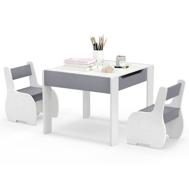 Gymax 4-in-1 Kids Wooden Table & 2 Chairs Set with storage and detachable blackboard. The set includes a white and gray table with reversible panels for drawing, writing, or dining, and two ergonomic chairs with backrests. Made of sturdy MDF, the table features a hidden storage compartment and rounded corners for safety. Suitable for children aged 3-6 years, ideal for playrooms, daycares, or living rooms.