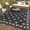 Black and white, variant on GlowSol 9x18 Outdoor Rug Waterproof Reversible - Plastic Straw Patio Mat with Geometric Cross Border Design, Foldable Camping & RV Rug for Deck, Backyard, Balcony, Picnic and Beach，Blue White