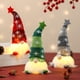thumbnail image 4 of Adorno navideño de anciano sin rostro con sombrero de estrella iluminado | Muñeco colgante con patas para árbol y chimenea | Colores rojo, gris y verde, 4 of 5