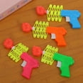 thumbnail image 2 of Retractable Plastic Spring Fist Shooter Funny Party Child Kids Trick Toy Gift, 2 of 7