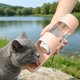 thumbnail image 5 of Vaso de agua portátil para mascotas para exteriores: botella de viaje plegable para perros con bandeja para beber que evita que se moje la boca, ideal para paseos, excursiones y viajes en coche., 5 of 6