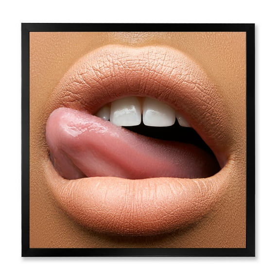Designart 'Beautiful Dark Skinned Female Tongue Touching Lips' Modern Framed Art Print