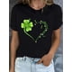 thumbnail image 1 of Camiseta con estampado de trébol y corazón del Día de San Patricio para mujer. Camiseta informal de algodón negro con diseño de trébol de cuatro hojas verde y pájaros. Manga corta, cuello redondo, lav, 1 of 5