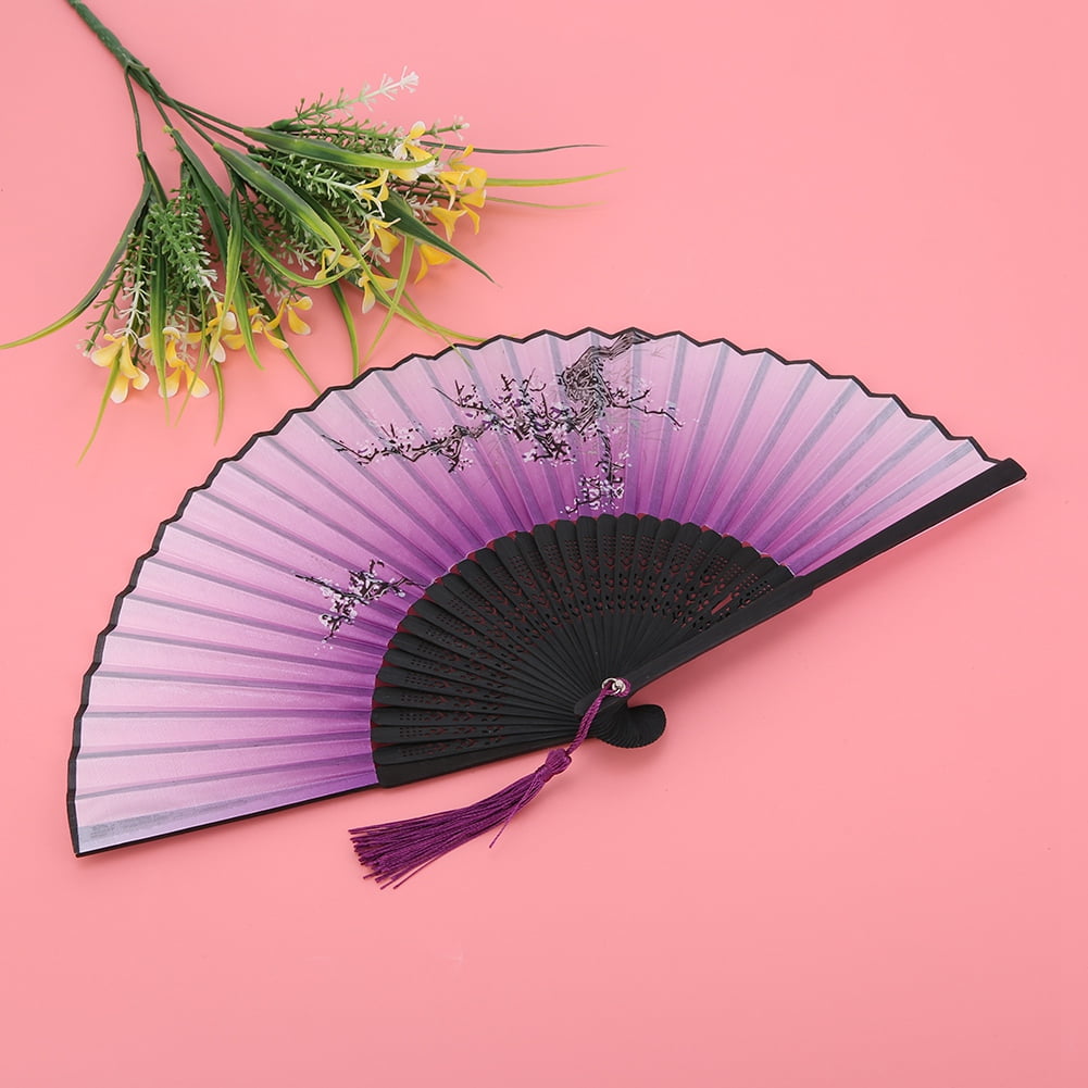 Great for hot days or wedding/ party accessories. Foldable Paper fan 