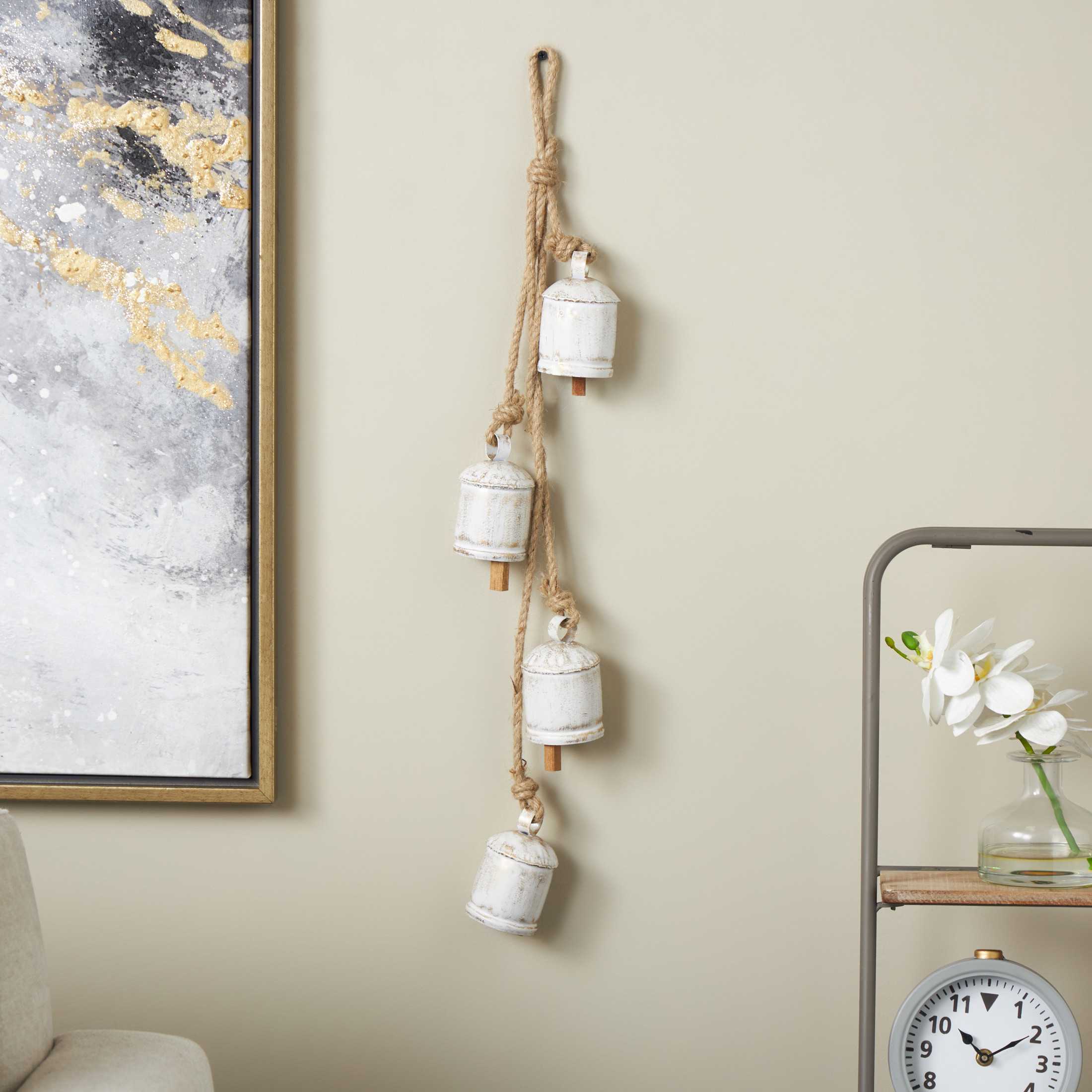 DecMode Tibetan Inspired Cascading White Metal Cylindrical Decorative Bells with 4 Bells on Jute Hanging Rope